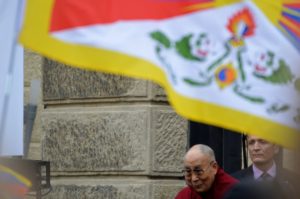 Dalai Lama with Tibetan flag in Prague, October 2016